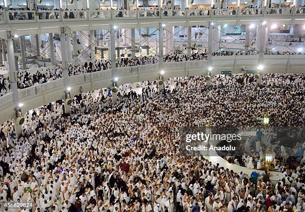 Muslim pilgrims at the Masjid al-Haram after performing the 'Jamarat' ritual, the stoning of Devil, in Mina near the holy city of Mecca, on October...