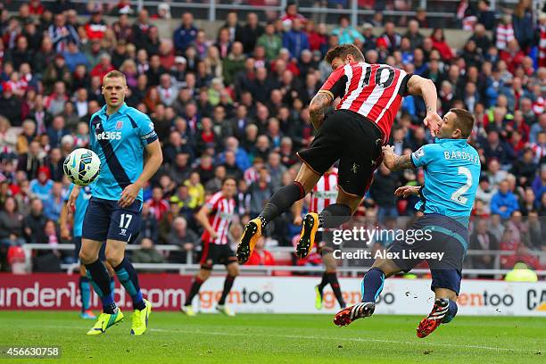 Connor Wickham of Sunderland heads the ball to score the opening goal during the Barclays Premier League match between Sunderland and Stoke City at...