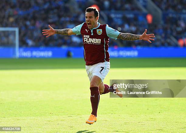 Ross Wallace of Burnley celebrates as he scores their second and equalising goal during the Barclays Premier League match between Leicester City and...