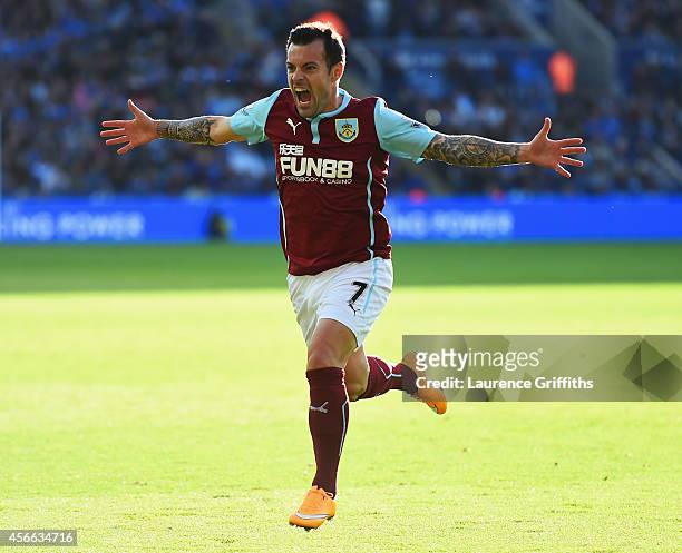 Ross Wallace of Burnley celebrates as he scores their second and equalising goal during the Barclays Premier League match between Leicester City and...