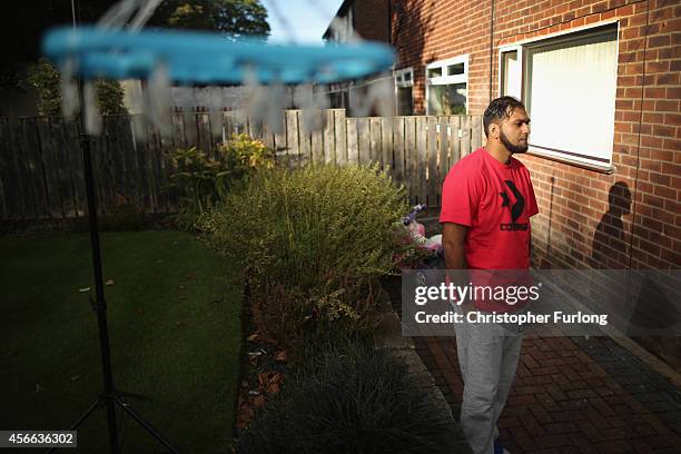 Kasim Jameel, aid convoy organiser and friend of murdered British aid worker Alan Henning, talks to the media at his home on October 4, 2014 in...