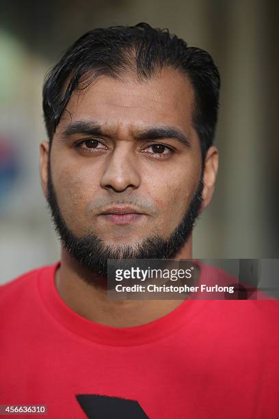 Kasim Jameel, aid convoy organiser and friend of murdered British aid worker Alan Henning, talks to the media at his home on October 4, 2014 in...