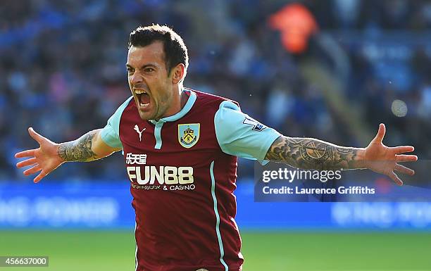 Ross Wallace of Burnley celebrates as he scores their second and equalising goal during the Barclays Premier League match between Leicester City and...