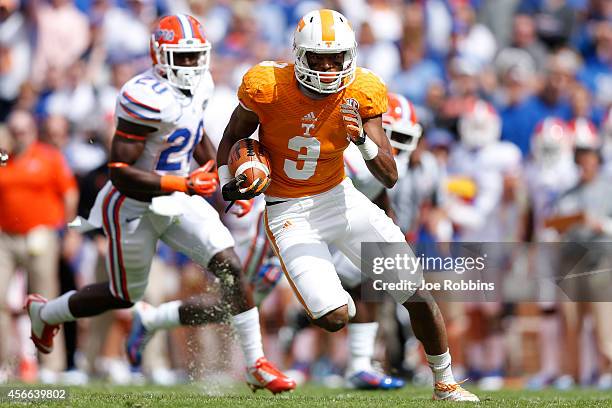 Josh Malone of the Tennessee Volunteers runs downfield after a reception during the first half of the game against the Florida Gators at Neyland...