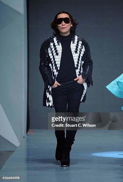 Fashion designer Michael Cinco on the runway after his show during Fashion Forward at Madinat Jumeirah on October 4, 2014 in Dubai, United Arab...