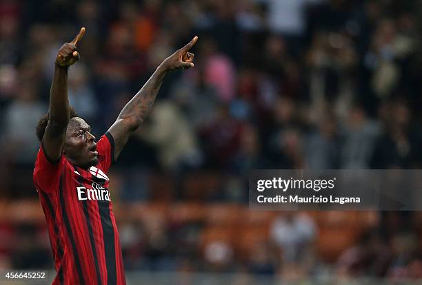 Sulley Muntari of Milan celebrates after scoring his team's opening goal during the Serie A match between AC Milan and AC Chievo Verona at Stadio...