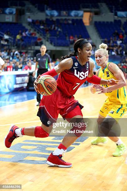 Maya Moore of the Women's Senior U.S. National Team drives against Rachel Jarry of Australia during the semifinal round of the 2014 FIBA World...