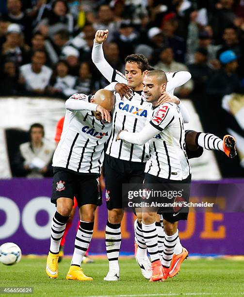 Anderson Martins of Corinthians celebrates their first goal during the match between Corinthians and Sport Recife for the Brazilian Series A 2014 at...