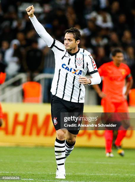 Anderson Martins of Corinthians celebrates their first goal during the match between Corinthians and Sport Recife for the Brazilian Series A 2014 at...