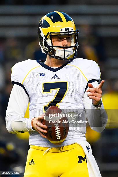 Shane Morris of the Michigan Wolverines warms up before a game against the Rutgers Scarlet Knights at High Point Solutions Stadium on October 4, 2014...