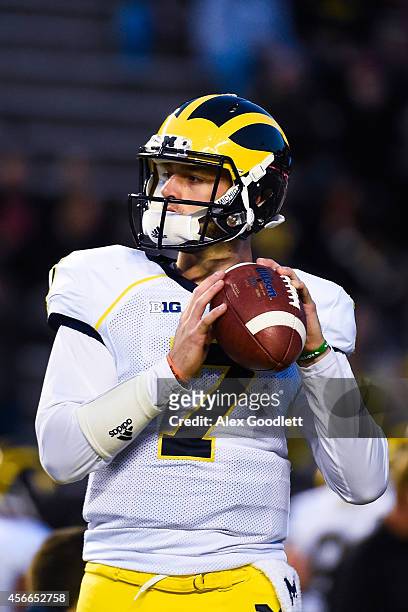 Shane Morris of the Michigan Wolverines warms up before a game against the Rutgers Scarlet Knights at High Point Solutions Stadium on October 4, 2014...