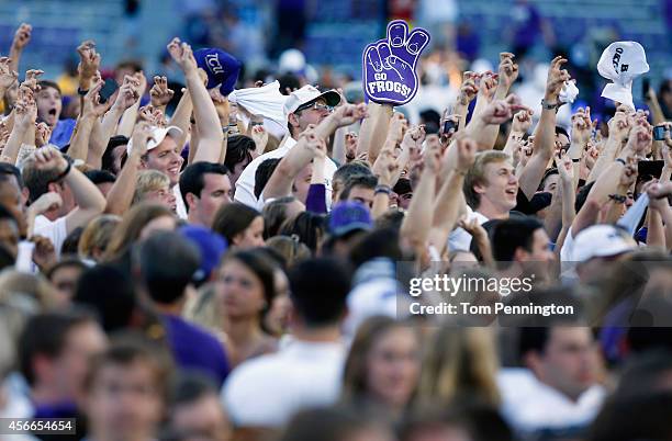 Fans rush the field after the TCU Horned Frogs beat the Oklahoma Sooners 37-33 at Amon G. Carter Stadium on October 4, 2014 in Fort Worth, Texas.