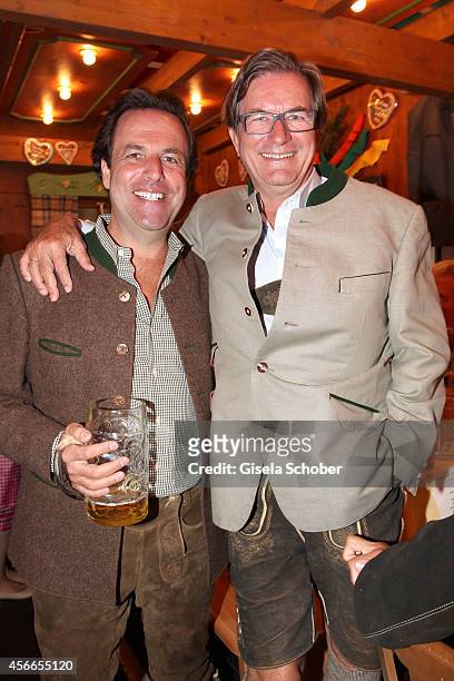 Florian Haffa and his brother Thomas Haffa during Oktoberfest at Schuetzenzelt/Theresienwiese on October 4, 2014 in Munich, Germany.