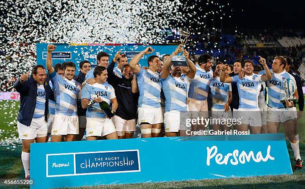 Players of Argentina celebrate with the trophy after winning a match between Argentina Los Pumas and Australia Wallabies as part of The Rugby...