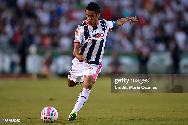 Severo Meza of Monterrey kicks the ball during a match between Monterrey and Tijuana as part of 12th round Apertura 2014 Liga MX at Tecnologico...