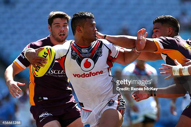Michael Ki of the Warriors is tackled during the 2014 Under 20's Holden Cup Grand Final match between the Brisbane Broncos and the New Zealand...