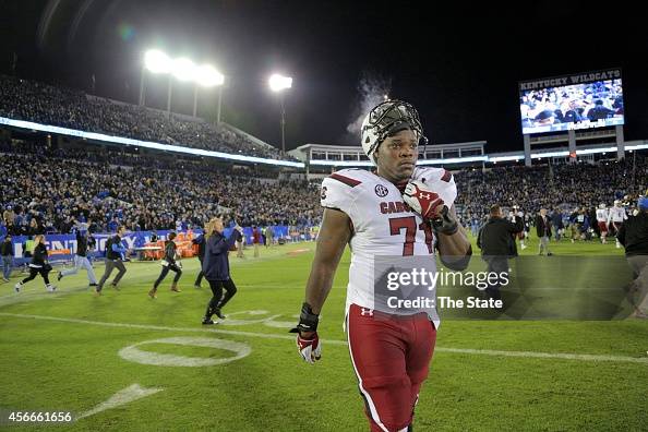 Brandon Shell College South Carolina offensive tackle Brandon Shell walks off the field as ...