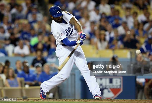 Matt Kemp of the Los Angeles Dodgers hits a solo homerun to lead off in the eighth inning of Game Two of the National League Division Series against...