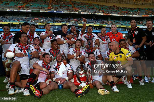 The Warriors celebrate winning the 2014 Under 20's Holden Cup Grand Final match between the Brisbane Broncos and the New Zealand Warriors at ANZ...