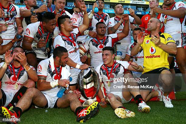 The Warriors celebrate winning the 2014 Under 20's Holden Cup Grand Final match between the Brisbane Broncos and the New Zealand Warriors at ANZ...