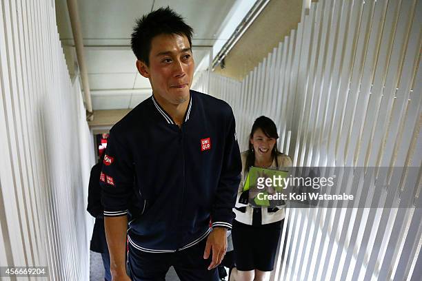 Winner Kei Nishikori of Japan leaves the court after winning the men's singles final match against Milos Raonic of Canada on day seven of Rakuten...