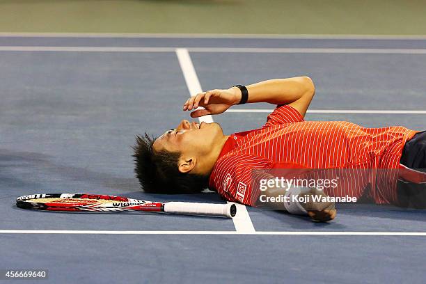 Kei Nishikori of Japan reacts after winning the men's singles final match against Milos Raonic of Canada on day seven of Rakuten Open 2014 at Ariake...