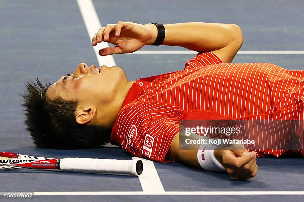 Kei Nishikori of Japan reacts after winning the men's singles final match against Milos Raonic of Canada on day seven of Rakuten Open 2014 at Ariake...