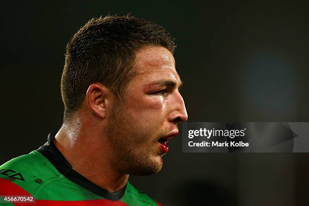 Sam Burgess of the Rabbitohs walks off the field at half time during the 2014 NRL Grand Final match between the South Sydney Rabbitohs and the...