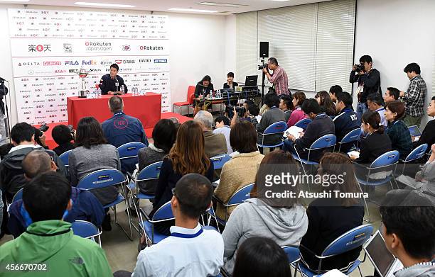 Kei Nishikori of Japan speaks during the press conference after winning the men's singles final match against Milos Raonic of Canada on day seven of...