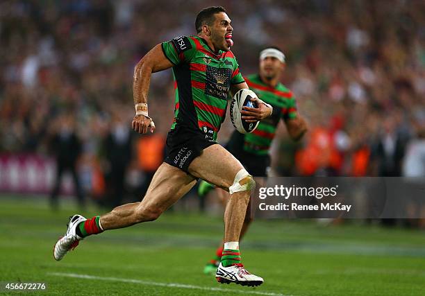 Greg Inglis of the Rabbitohs scores a try during the 2014 NRL Grand Final match between the South Sydney Rabbitohs and the Canterbury Bulldogs at ANZ...