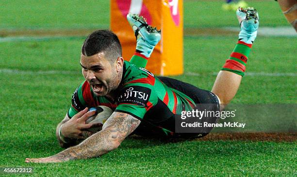 Adam Reynolds of Souths scores a try during the 2014 NRL Grand Final match between the South Sydney Rabbitohs and the Canterbury Bulldogs at ANZ...