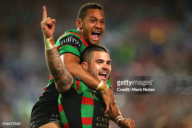 Adam Reynolds and Apisai Koroisau of the Rabbitohs celebrate after a try during the 2014 NRL Grand Final match between the South Sydney Rabbitohs and...