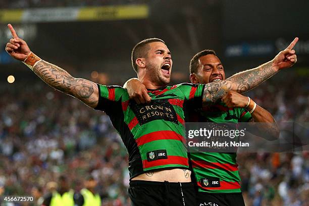 Adam Reynolds and Apisai Koroisau of the Rabbitohs celebrate after a try during the 2014 NRL Grand Final match between the South Sydney Rabbitohs and...