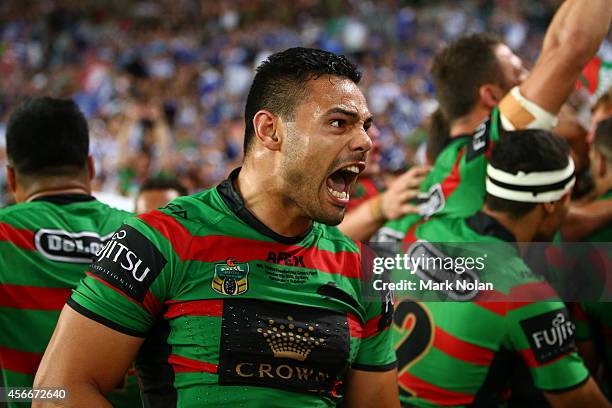 Ben Te'o of the Rabbitohs celebrates winning the 2014 NRL Grand Final match between the South Sydney Rabbitohs and the Canterbury Bulldogs at ANZ...