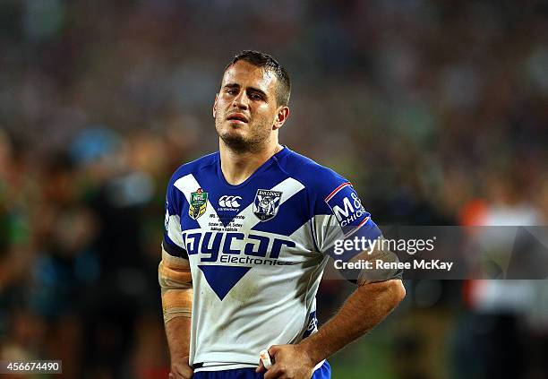 Dejected Bulldogs player Josh Reynolds after his teams loss at the 2014 NRL Grand Final match between the South Sydney Rabbitohs and the Canterbury...