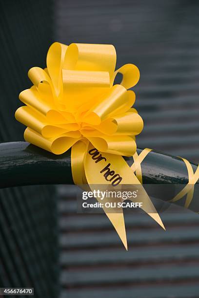 Yellow ribbon for murdered British hostage Alan Henning, is seen in the town centre of Eccles, north west England on October 5, 2014. Britain united...