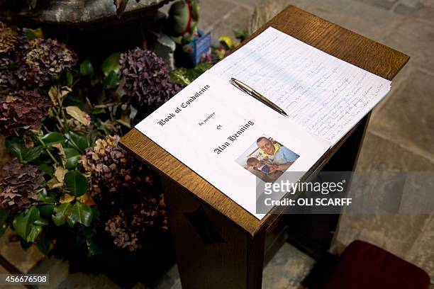 The book of condolence in memory of murdered aid worker Alan Henning, is displayed in Eccles Parish Church in Eccles, north west England on October...