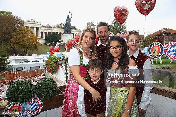 Claudio Pizarro of FC Bayern Muenchen and his wife Karla Salcedo attend the Oktoberfest beer festival at Kaefer Wiesnschaenke tent at Theresienwiese...