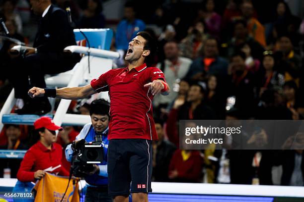 Novak Djokovic of Serbia celebrates after winning the men's singles final match against Tomas Berdych of the Czech Republic during day nine of the...
