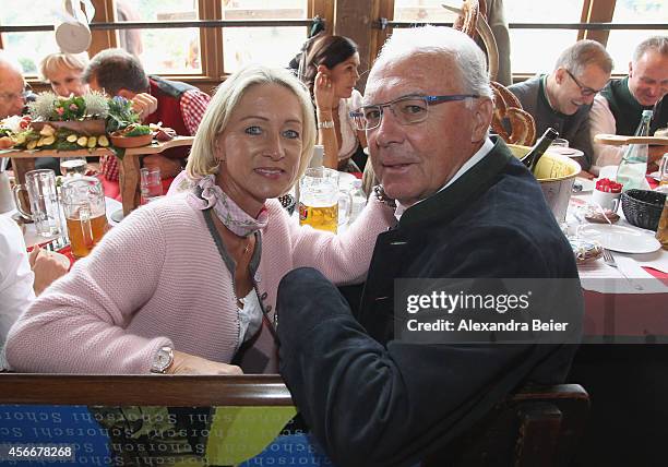 Franz Beckenbauer and his wife Heidi attend the Oktoberfest 2014 beer festival at Kaefers Wiesenschaenke at Theresienwiese on October 5, 2014 in...