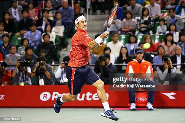 Kei Nishikori of Japan in action during the men's singles final match against Milos Raonic of Canada on day seven of Rakuten Open 2014 at Ariake...