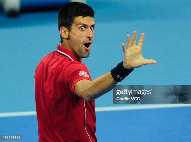 Novak Djokovic of Serbia celebrates after winning the men's singles final match against Tomas Berdych of the Czech Republic during day nine of the...