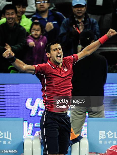 Novak Djokovic of Serbia celebrates after winning the men's singles final match against Tomas Berdych of the Czech Republic during day nine of the...