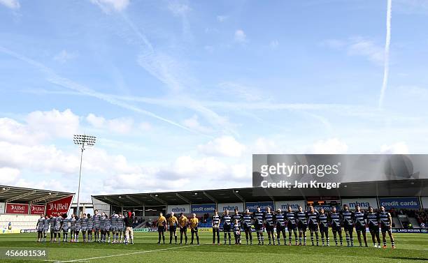 Players observe one minutes silence in memory of Alan Henning prior to the Aviva Premiership match between Sale Sharks and Wasps at AJ Bell Stadium...