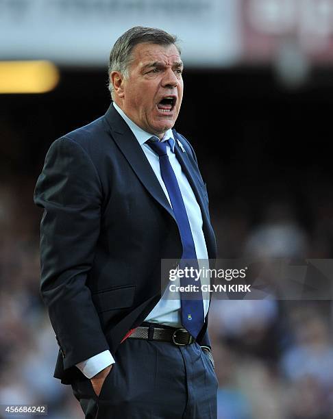 West Ham United's English manager Sam Allardyce gestures during the English Premier League football match between West Ham United and Queens Park...