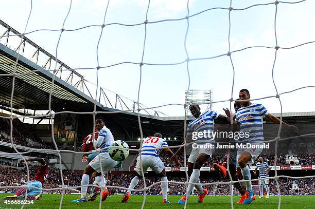 Nedum Onuoha of QPR scores an own goal during the Barclays Premier League match between West Ham United and Queens Park Rangers at Boleyn Ground on...