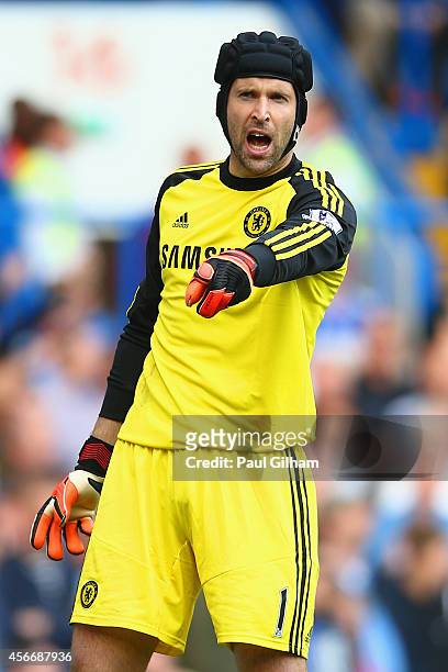 Petr Cech of Chelsea in action during the Barclays Premier League match between Chelsea and Arsenal at Stamford Bridge on October 4, 2014 in London,...