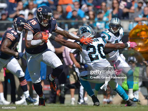 Brandon Marshall of the Chicago Bears makes a catch against Antoine Cason of the Carolina Panthers during their game at Bank of America Stadium on...