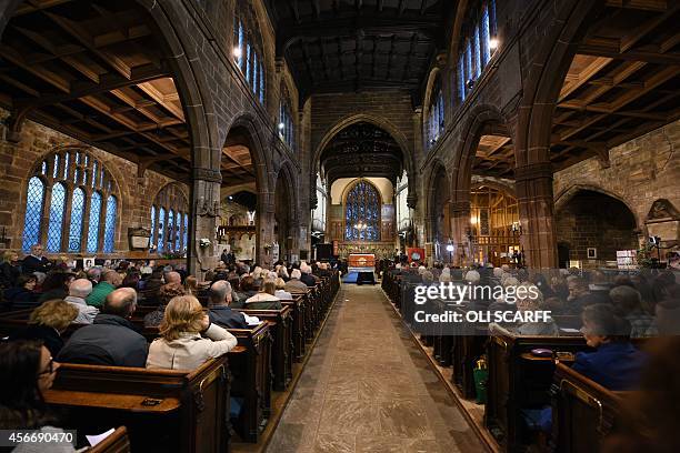 Members of public, including Barbara Henning, the wife of murdered British aid worker Alan Henning, attend a quiet service of remembrance for Mr...
