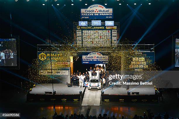 Jari Matti Latvala of Finland and Mikka Anttila of Finland celebrate their victory in the final podium of Strasbourg during Day Three of the WRC...